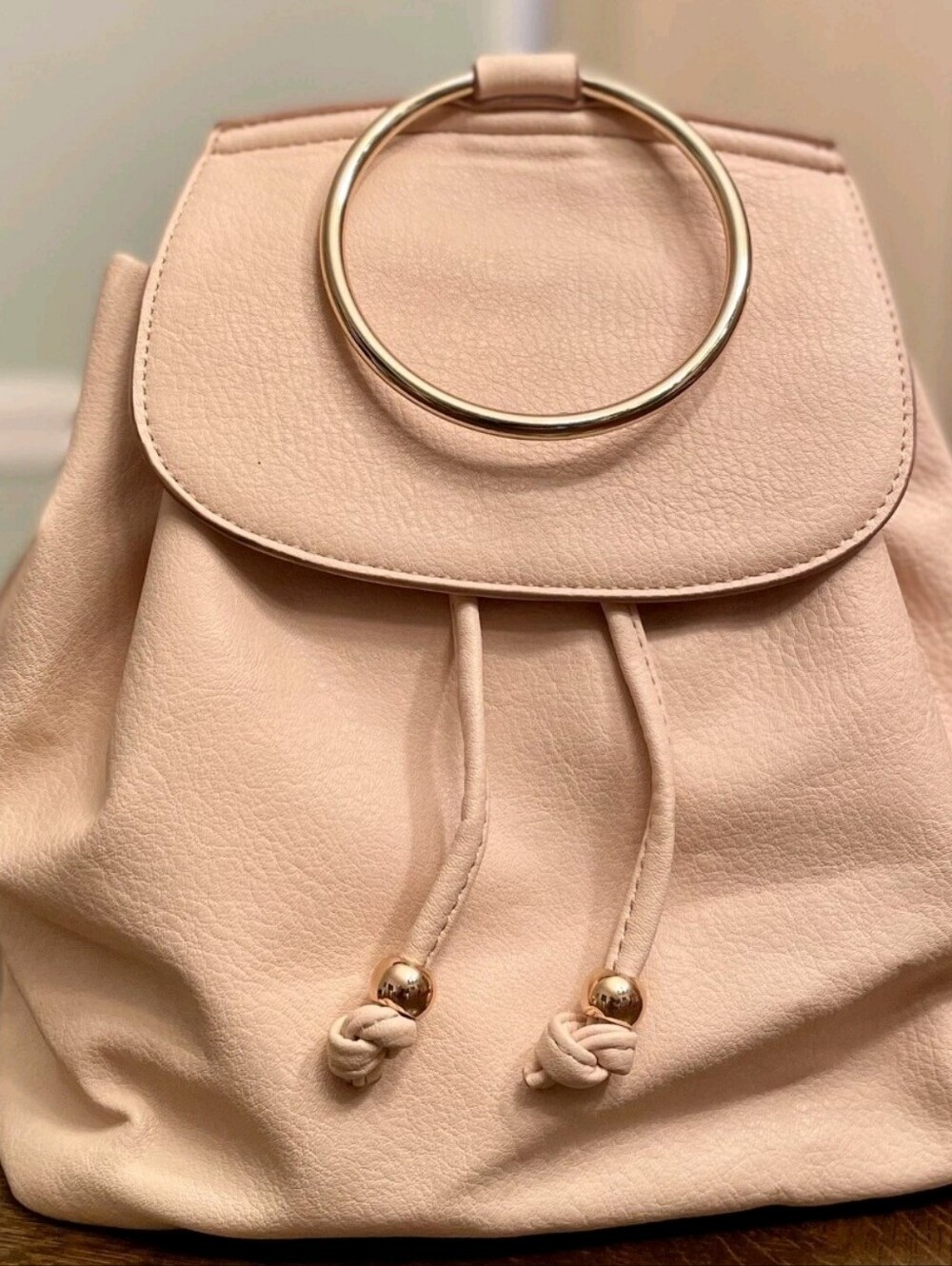 Lauren Conrad O ring backpack bag in peach/rose gold